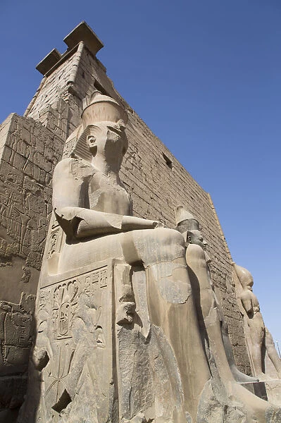 Colossus of Ramses II in front of Pylon, Luxor Temple, UNESCO World Heritage Site, Luxor