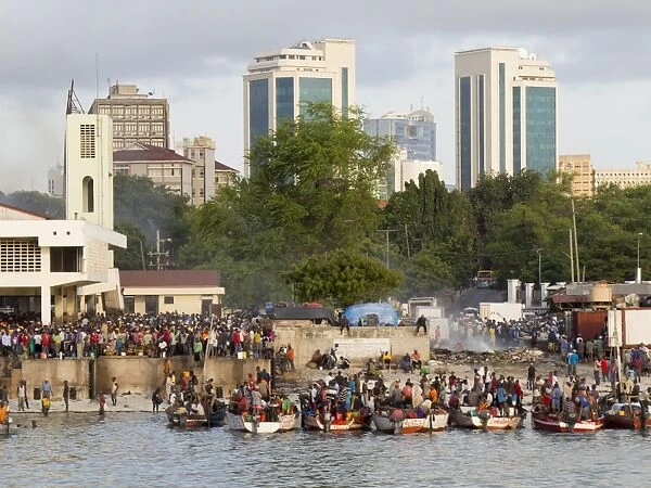 Fishing market with modern city behind, Dar es Salaam, Tanzania, East Africa, Africa
