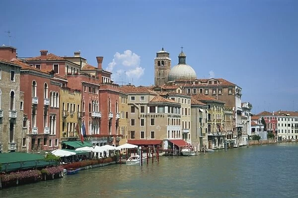 Houses and cafes on the Grand Canal and San Geremia church