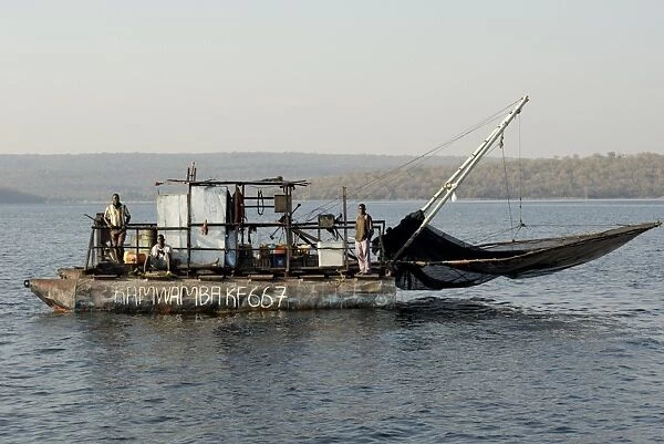 Kapenta fishing boat and crew, early morning, Lake Kariba, Zimbabwe, Africa