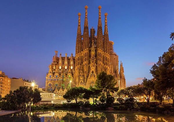 La Sagrada Familia church lit up at night designed by Antoni Gaudi, UNESCO World Heritage Site