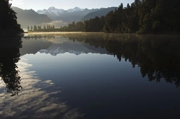 Lake Matheson in the evening reflecting a near perfect