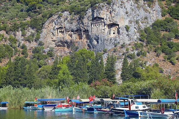 Lycian tombs of Dalyan with fishing and tourists boats below, Dalyan, Anatolia, Turkey, Asia Minor, Eurasia