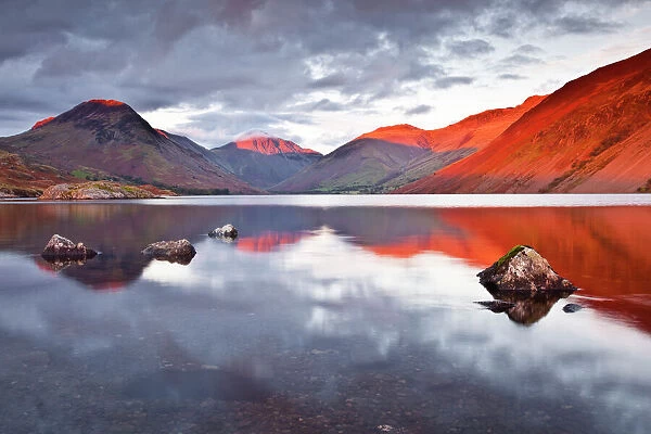 The Scafell range across the reflective waters of Wast Water in the Lake District National Park, Cumbria, England, United Kingdom, Europe