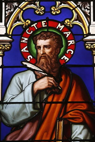 Stained glass window of St. Mark at Collegiale Notre-Dame des Marais