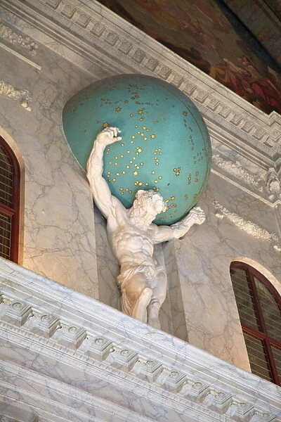Statue of Atlas holding the Universe on his shoulders in the Royal Palace, Amsterdam, Netherlands, Europe