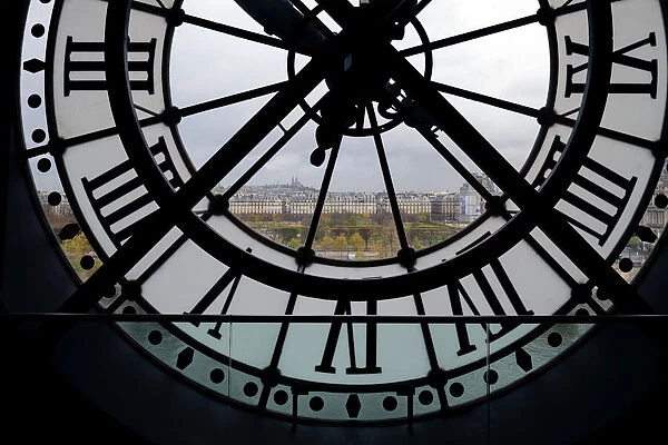 View through clock face from Musee D Orsay toward Montmartre, Paris, France, Europe
