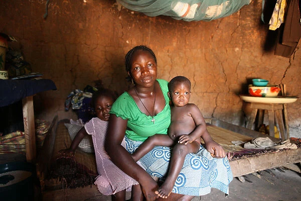 Woman and children in an African hut, Tori, Benin, West Africa, Africa