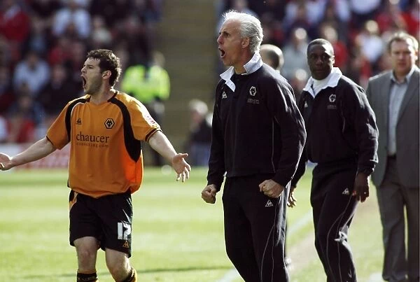 Mick McCarthy and Matthew Jarvis: Leading Wolverhampton Wanderers to Championship Glory at Barnsley's Oakwell (April 2009)