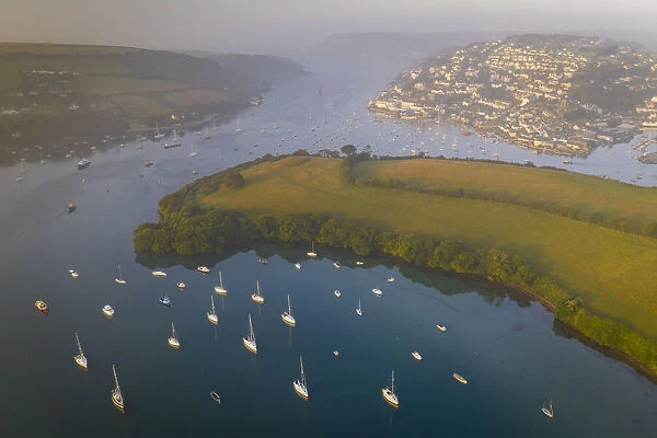 Aerial view of Salcombe and the Kingsbridge Estuary at dawn on a misty morning