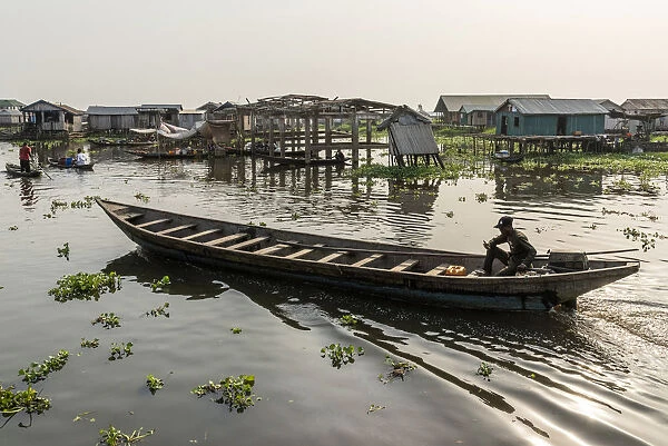 Africa, Benin, Lake Nokoua. A wooden boat in the famous stilt village of Ganvie
