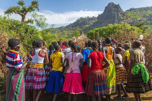 Africa, Uganda, Karamoja. Namalu. Girls and women of the Karamojong tribe are singing during a wedding ceremony