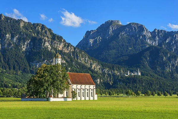 Church St. Coloman with Neuschwanstein castle and Saauling mountain, Schwangau, Bavaria
