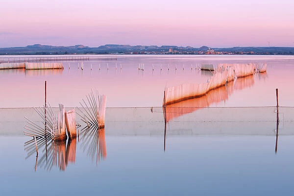 Europe, Italy, Puglia, Foggia district, Lesina. Lake at sunset