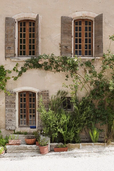 The facade of an old house in Oppede le Vieux in Provence France
