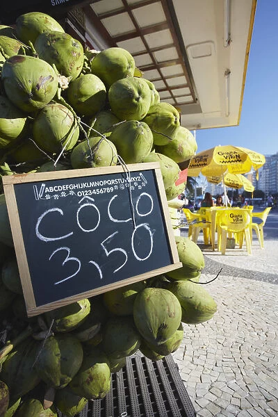 Fresh coconuts at cafe along Avenida Atlantica, Copacabana, Rio de Janeiro, Brazil