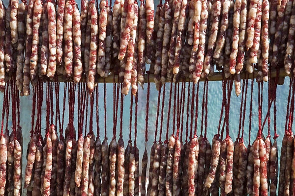 India, West Bengal, Kalimpong, Home-made sausages hanging to dry