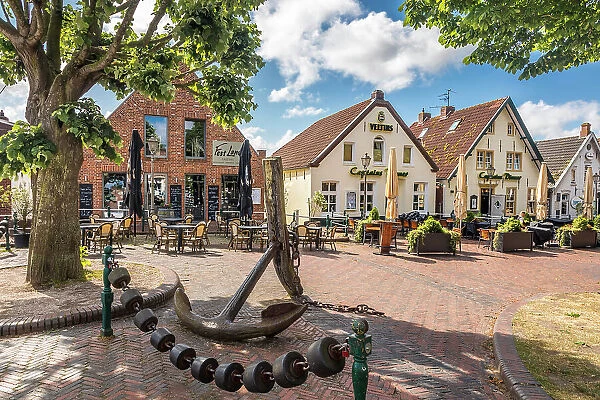 Restaurants at the harbor in Greetsiel, East Frisia, Lower Saxony, Germany