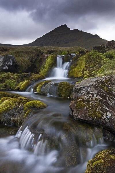 Rocky stream with waterfalls below Slaettaratindur mountain, Eysturoy, Faroe Islands, Europe