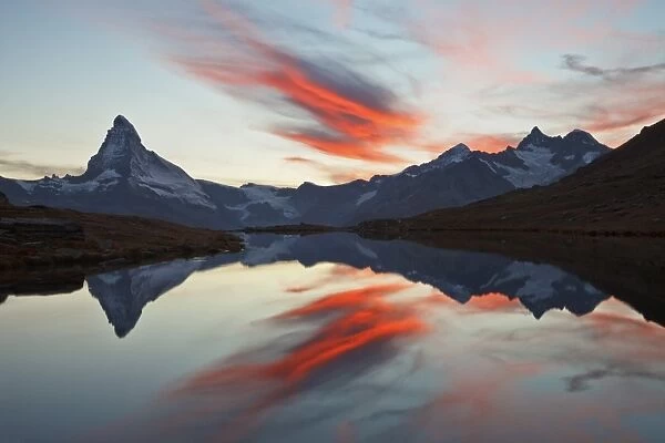 Switzerland, Valais, The Sky on fire during the Sunset above the Matterhorn