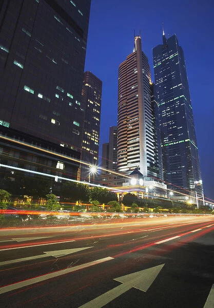 Traffic passing in front of CITIC Plaza, Guangzhou, Guangdong Province, China