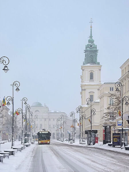 View over Krakowskie Przedmiescie towards Holy Cross Church, winter, Warsaw, Masovian Voivodeship, Poland