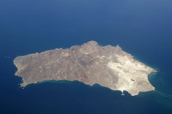 An aerial view of Isla San Marcos off the Baja Peninsula on the Gulf of California (Sea of Cortez) side. Baja California, Mexico. Note the dock and white gypsum mine operation on the lower (SW) side of the island