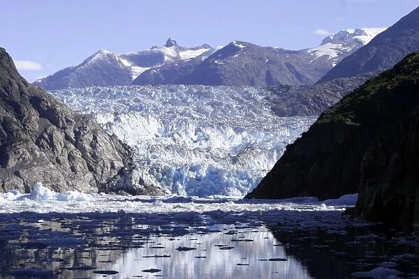 South Sawyer Glacier with icebergs  /  bergy bits calved off in Tracy Arm, Southeasat Alaska, USA. Pacific Ocean