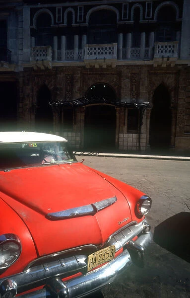 10011504. CUBA Havana Detail of red US style car