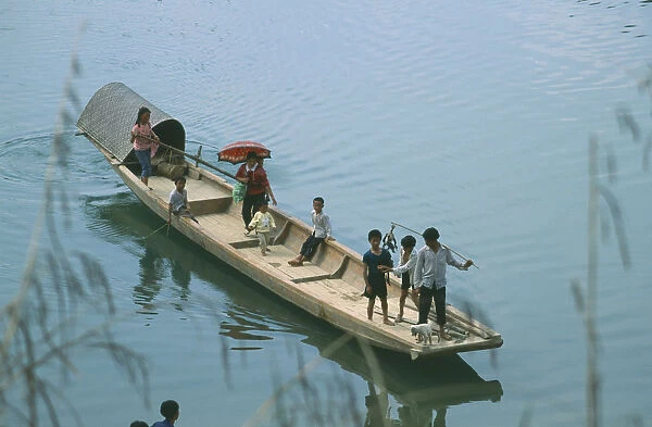 10055393. CHINA Ferry Passenger Ferry Crossing River with people standing