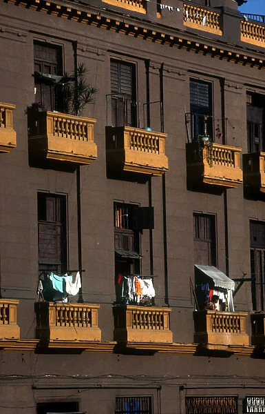10093398. CUBA Havana Brown coloured balconies with hanging washing