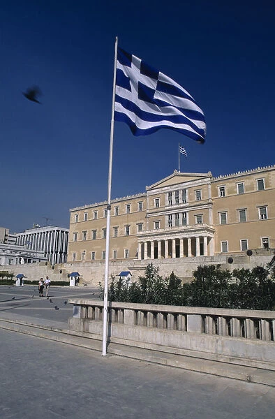 10125806. GREECE Athens Parliament Building and Greek Flag in the foreground
