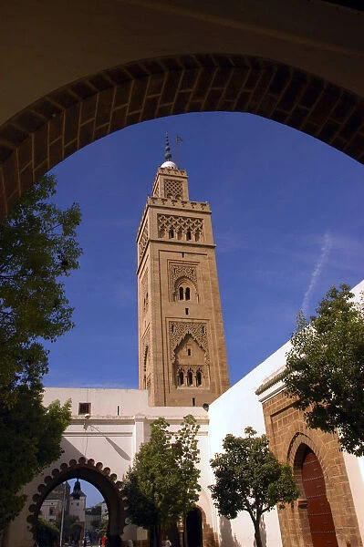 20038612. MOROCCO Casablanca Minaret seen through archway