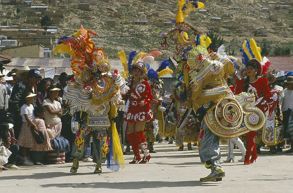 20049618. BOLIVIA Oruro La Diablada Carnival procession and spectators