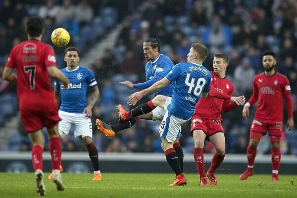 Intense Moment: Bruno Alves Tackles Greg Docherty in Rangers vs Falkirk Scottish Cup Quarterfinal Clash at Ibrox Stadium