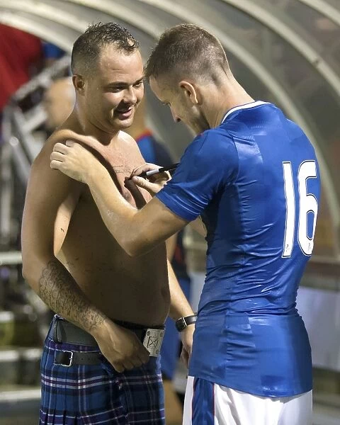 Rangers FC: Andy Halliday Signs Fan's Chest at Charleston Battery Pre-Season Match