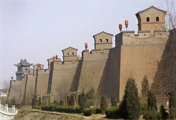 CITY WALL AT PINGYAO DECORATED WITH RED LANTERNS FOR CHINESE NEW YEAR