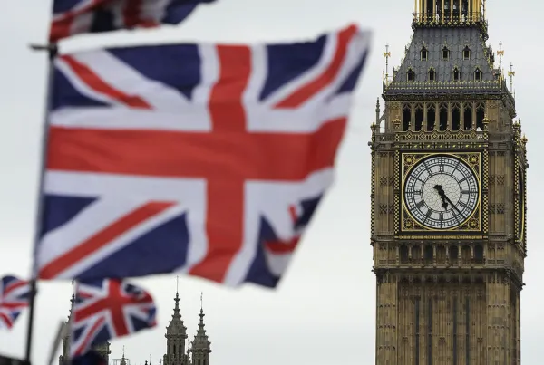 Flags are seen above a souvenir kiosk near Big Ben clock at the Houses of Parliament