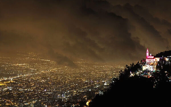 General view of illuminated Christmas decorations at Monserrate church in Bogota