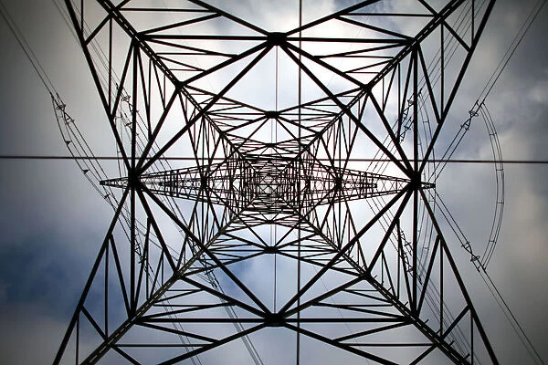 A high-voltage power line tower is seen near Berlin