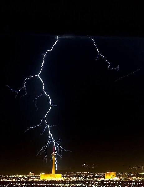 LIGHTNING STORM BEHIND STRATOSPHERE HOTEL AND CASINO IN LAS VEGAS