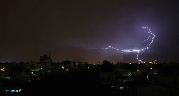 Lightning strikes over Villa Urquiza neighbourhood during a thunderstorm in Buenos Aires