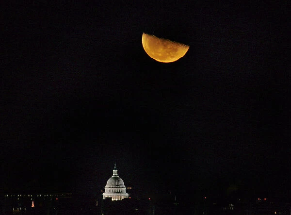 The Third Quarter moon rises over the U. S