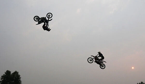 Riders perform during the Red Bull X-fighters Jams show in Krasnoyarsk