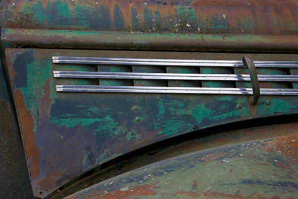 A detail of an abadoned Chevy truck that had been used as part of Alaska Air transport