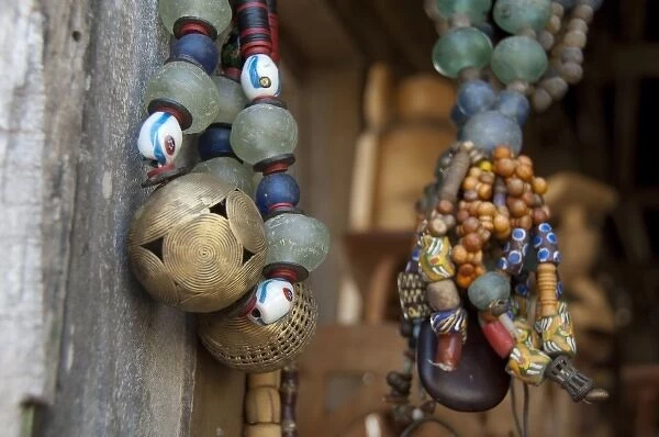 Africa, Benin, Ganvie. Tofinu voodoo village on Lake Nokoue. Traditional souvenir beaded necklaces