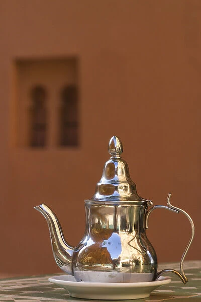 Africa, Morocco, Dades Gorge. Tea service reflects the colors of the steep walls