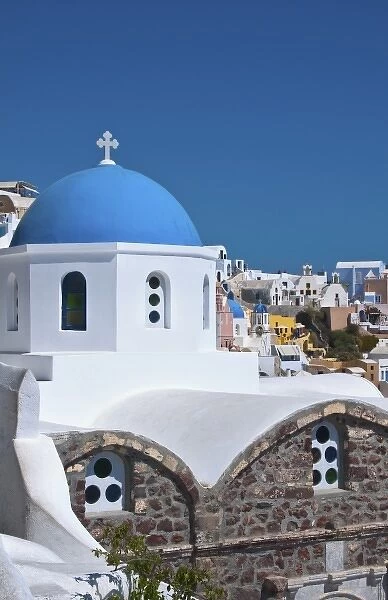 Blue domb church of beautiful Oia in Greek Island of Santorini Greece on cliffs
