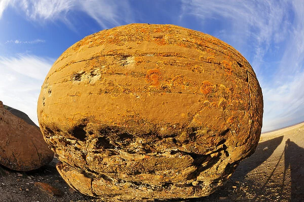 Canada, Alberta, Red Rock Coulee Natural Preserve. Round sandstone concretion. Credit as