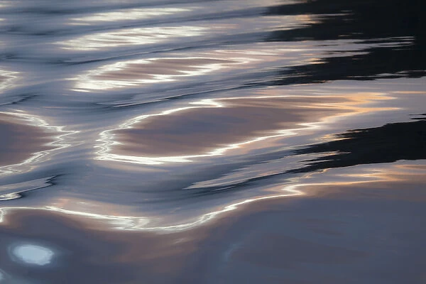 Canada, British Columbia, Broughton Islands. Sunset on water wave patterns. Credit as